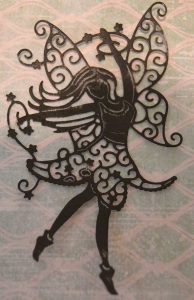 Fairy diecut covered with black Versafine ink