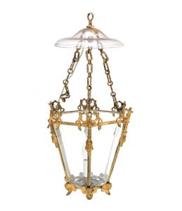 An attractive Regency gilt bronze hanging candle lantern of small size
