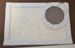 Double sided foam tape around the circle and edges