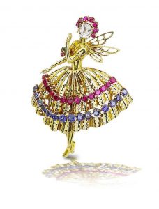 A diamond, ruby, sapphire and emerald "dancer" brooch, by Van Cleef & Arpels, circa 1945